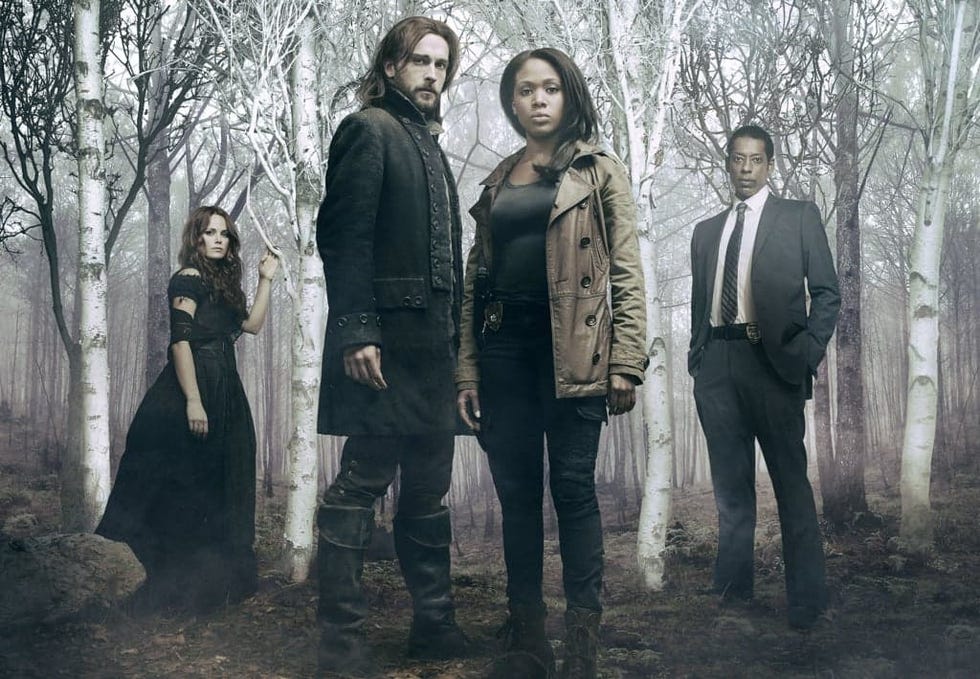 Sleepy Hollow TV cast Sleepy Hollow TV cast: Tom Mison as Ichabod Crane and Nicole Beharie as Abbie Mills