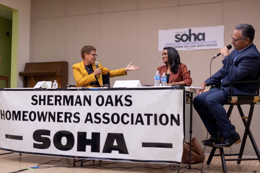 Los Angeles Mayor Karen Bass, left, and Los Angeles Councilwoman and mayoral candidate Nithya Raman, right, take part in a candidate forum hosted by the Sherman Oaks Homeowners Association on Tuesday, May 5, 2026.