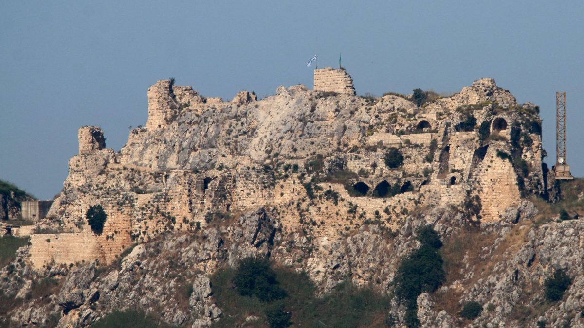 An Israeli flag and a flag of the Golani Brigade fly on Beaufort Castle, as seen from Marjayoun, southern Lebanon, June 1, 2026. REUTERS/Stringer