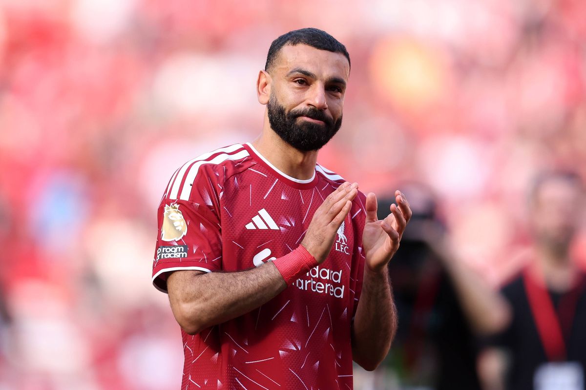 Mohamed Salah appears emotional as he applauds the fans following his final appearance for the club