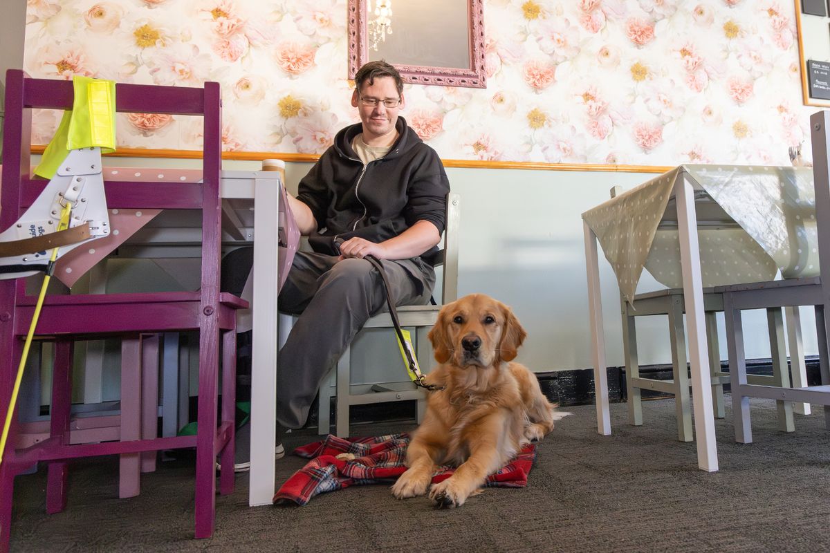 Oliver Perry with guide dog Walter