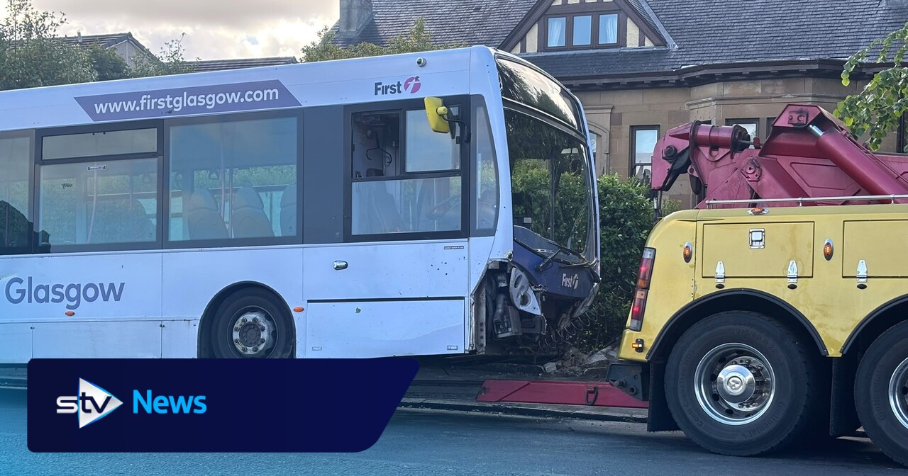 Four passengers injured after bus crashes into garden in Clydebank