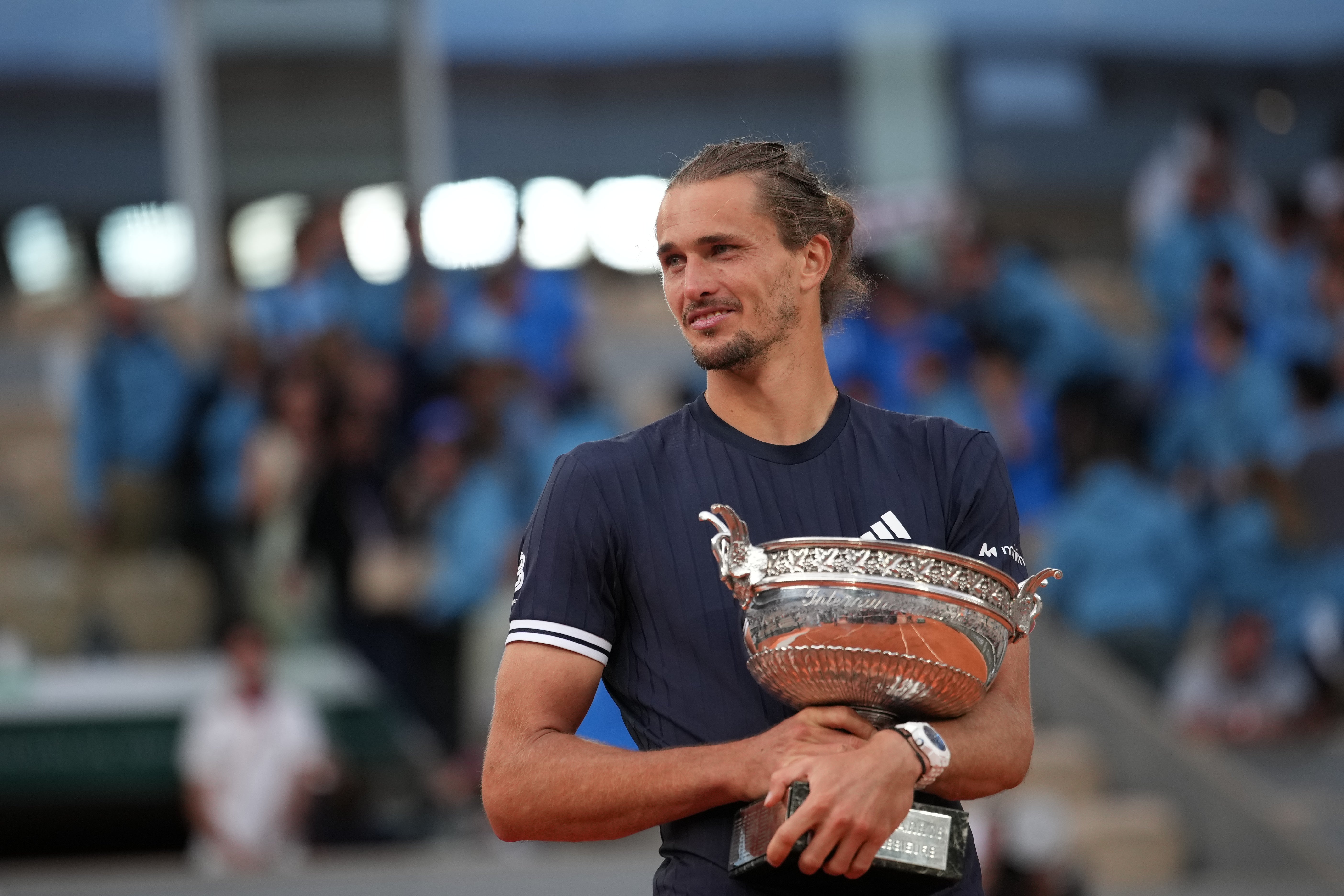 Alexander Zverev of Germany celebrates with the trophy after winning the men's final match against Flavio Cobolli of Italy at the French Open