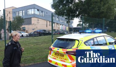 Girl, 14, charged in connection with triple stabbing at school in Manchester | UK news