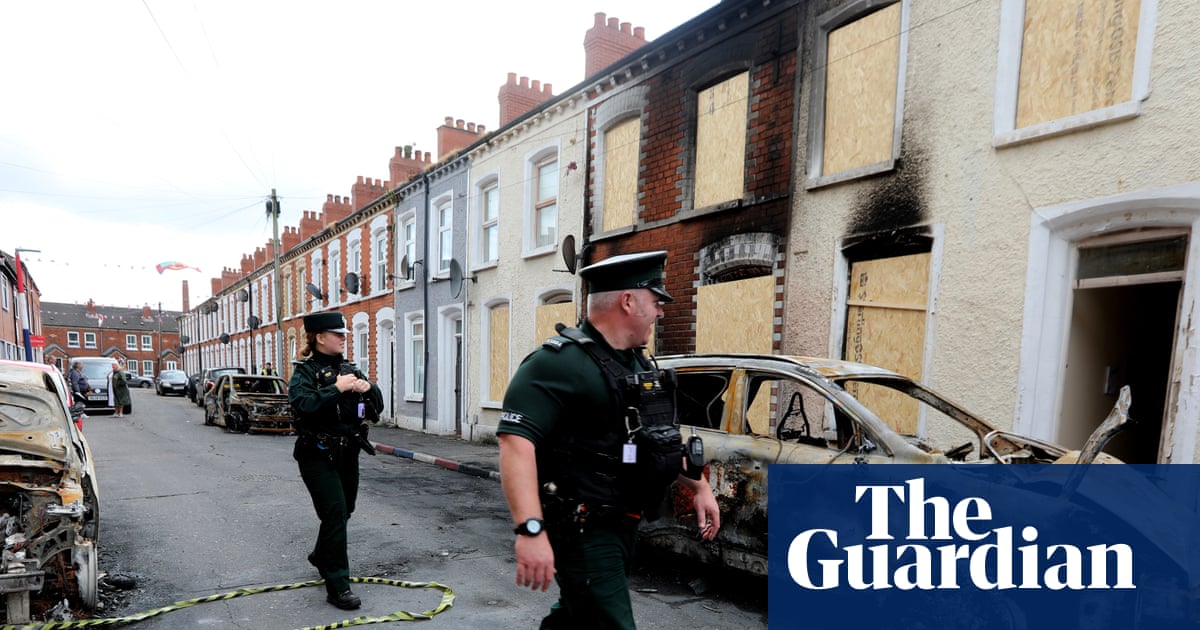 Number of arrests after riots in Northern Ireland rises to 19 | UK news