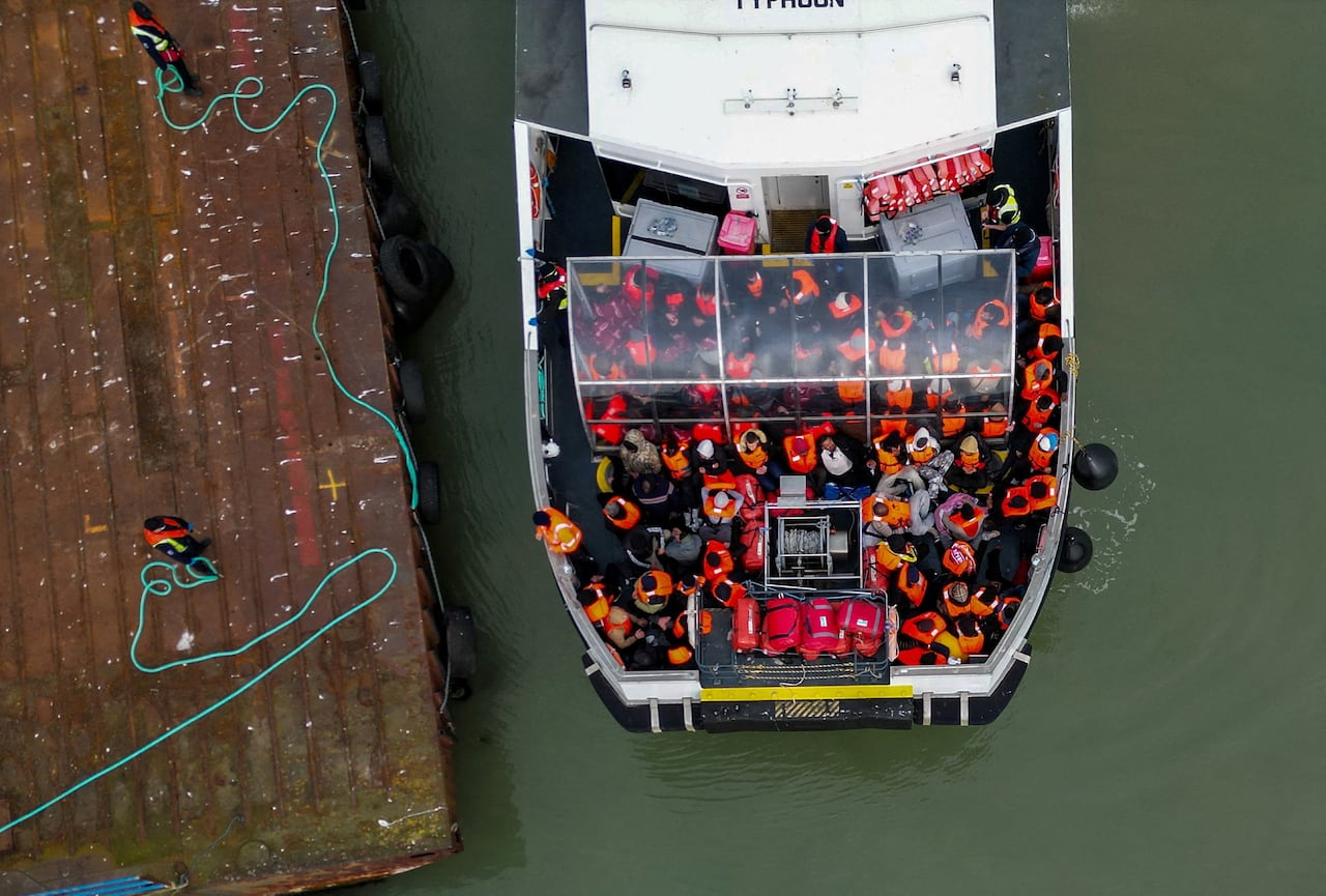 A drone view of a British Border Force vessel carrying migrants arriving in to Ramsgate Harbour, in Ramsgate, Britain, March 6, 2026.