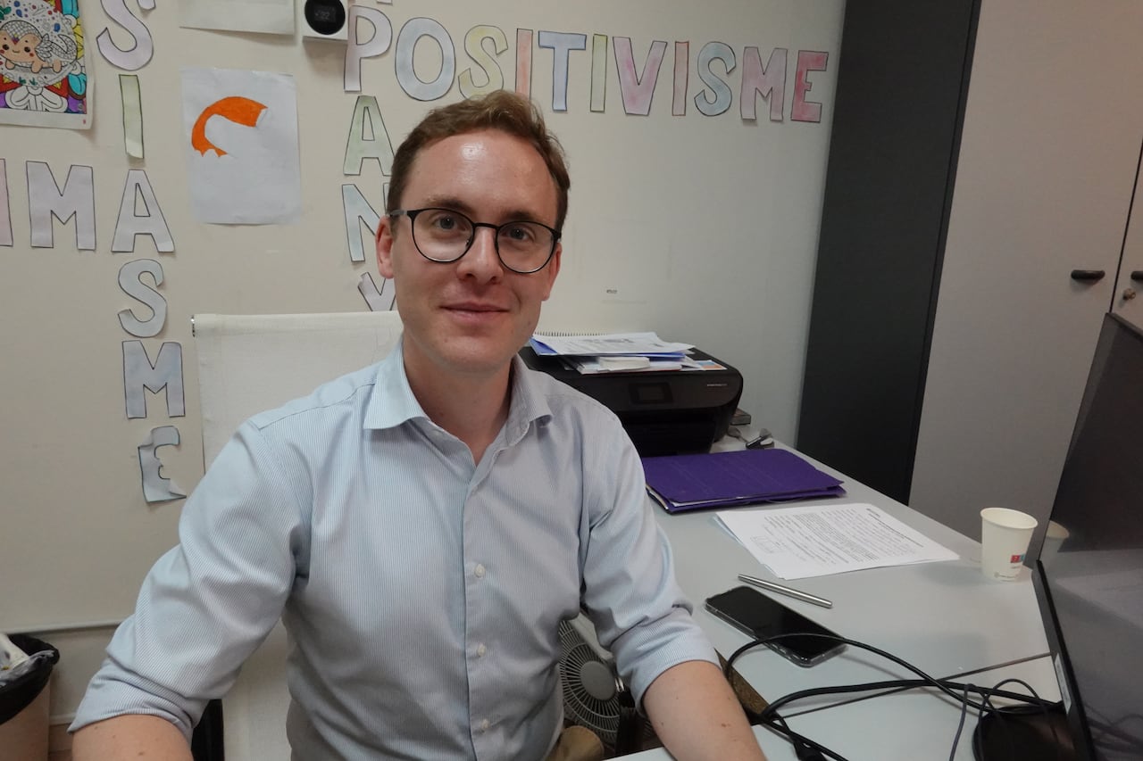 Oriol Nebot, a lawyer working with Catholic NGO Cáritas, is helping migrants in Barcelona apply to stay in Spain legally.