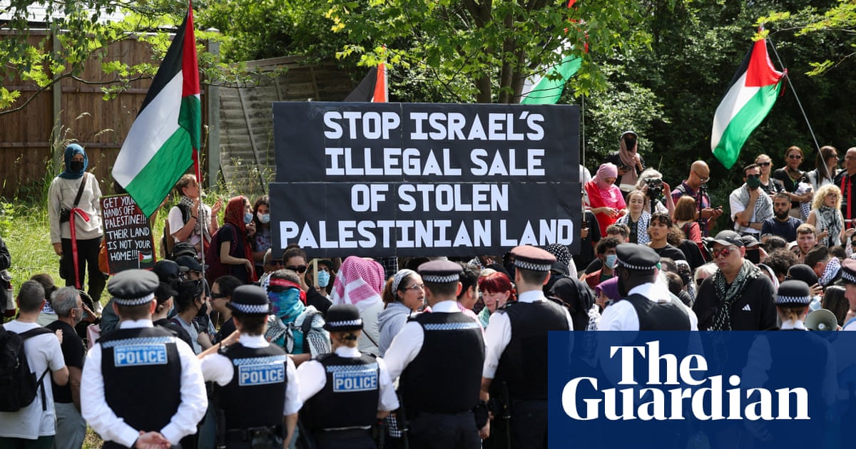 Police arrest 14 at rival protests over Israeli property event in London | UK news
