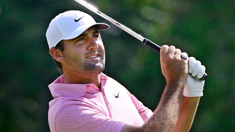 Scottie Scheffler holds a one-shot lead at the Travelers Championship through 13 holes, after bad weather stops play