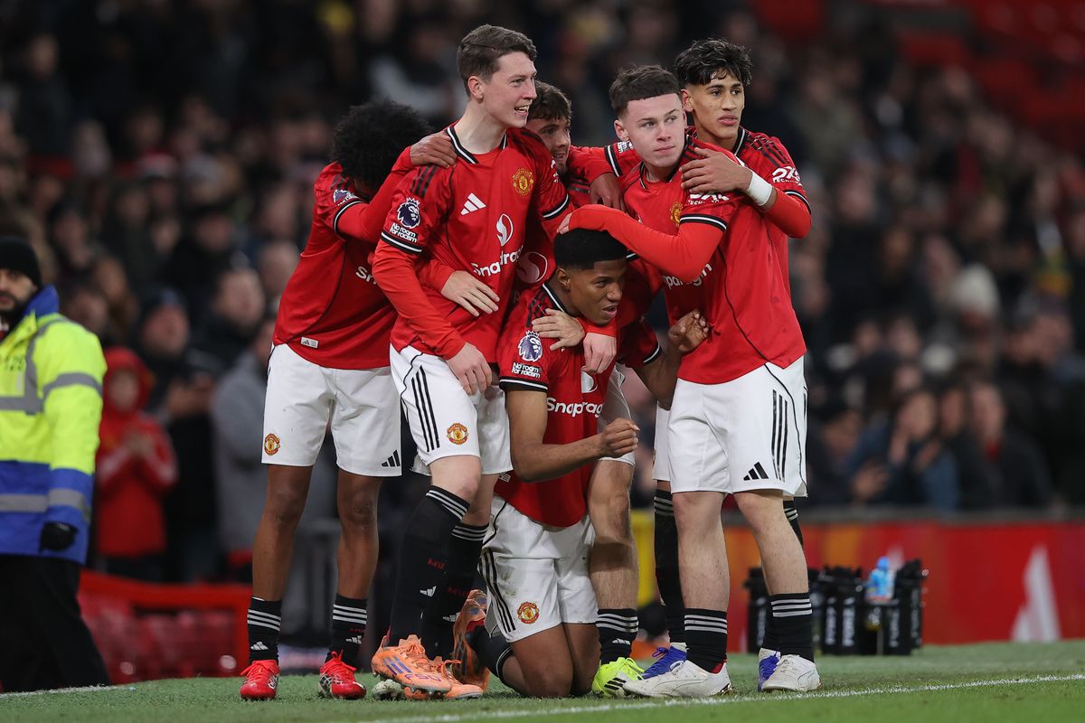 Chido Obi of Manchester United celebrates with teammates after scoring their side's second goal during the FA Youth Cup fourth round match between Manchester United and Derby County at Old Trafford on January 23, 2026 in Manchester, England.