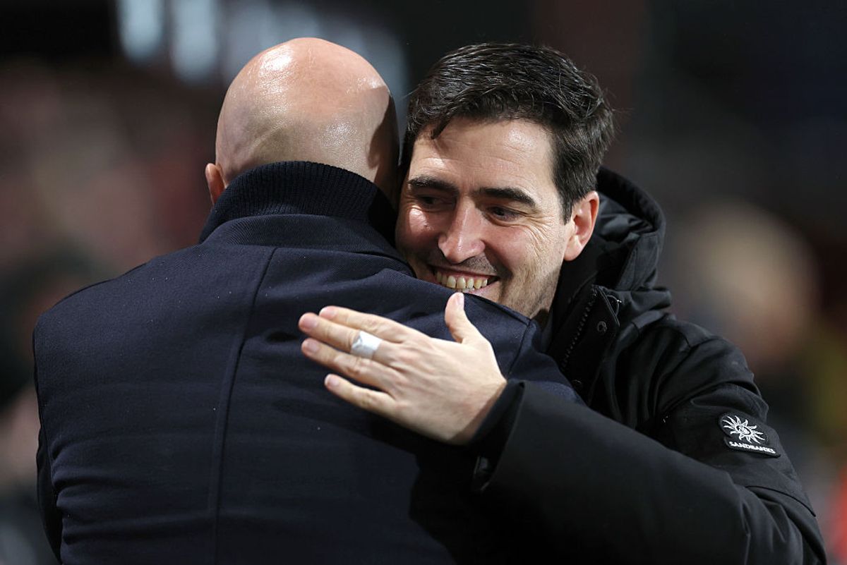 BOURNEMOUTH, ENGLAND - JANUARY 24: Andoni Iraola, Manager of AFC Bournemouth, hugs Arne Slot, Manager of Liverpool, prior to the Premier League match between Bournemouth and Liverpool at Vitality Stadium on January 24, 2026 in Bournemouth, England. (Photo by Ryan Pierse/Getty Images)
