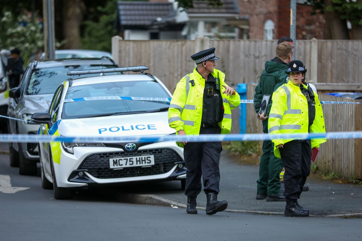 Police on Abram Close at the weekend