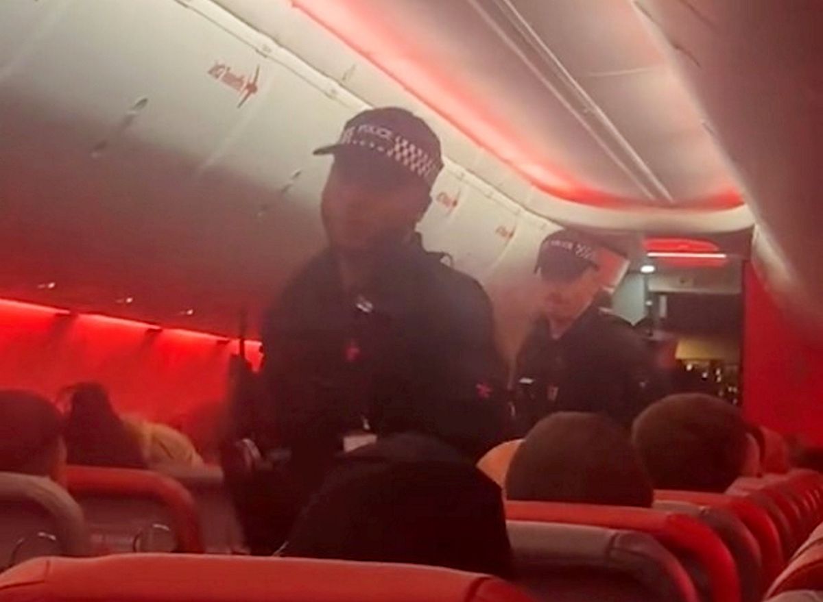 Police responded to the incident after the plane landed in Manchester