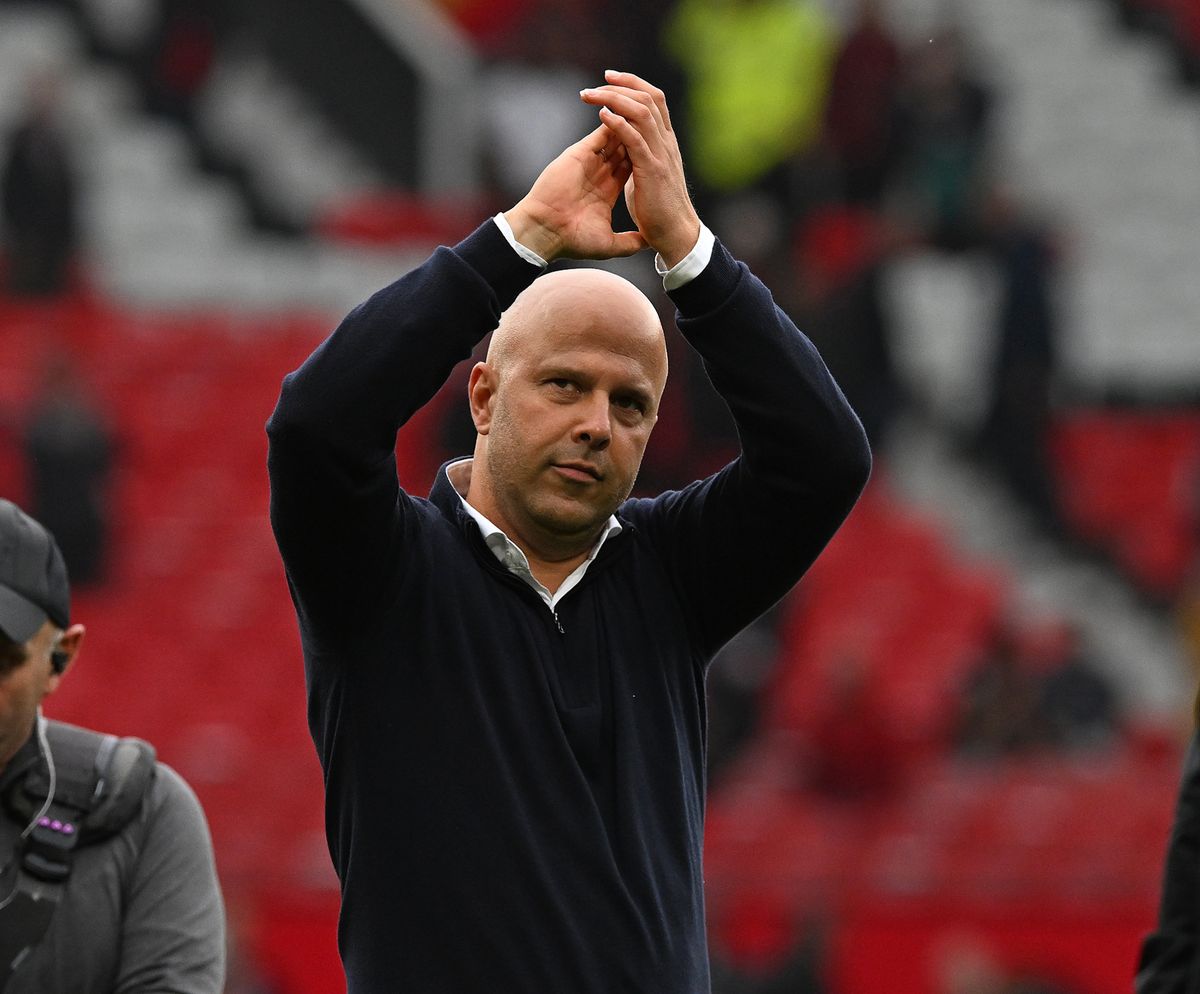 Arne Slot Head Coach of Liverpool showing his appreciation to the fans at the end of the Premier League match between Manchester United FC and Liverpool