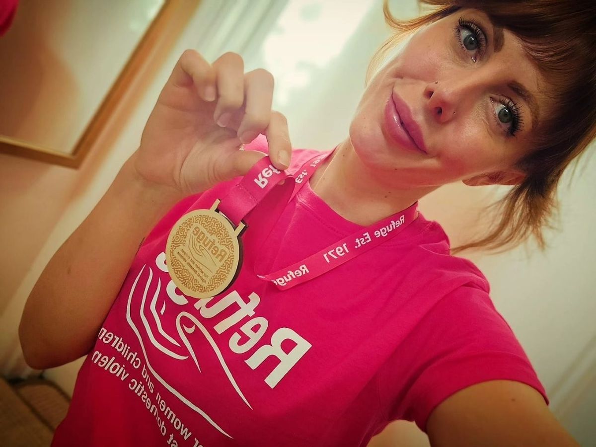 Sally showing off running medal