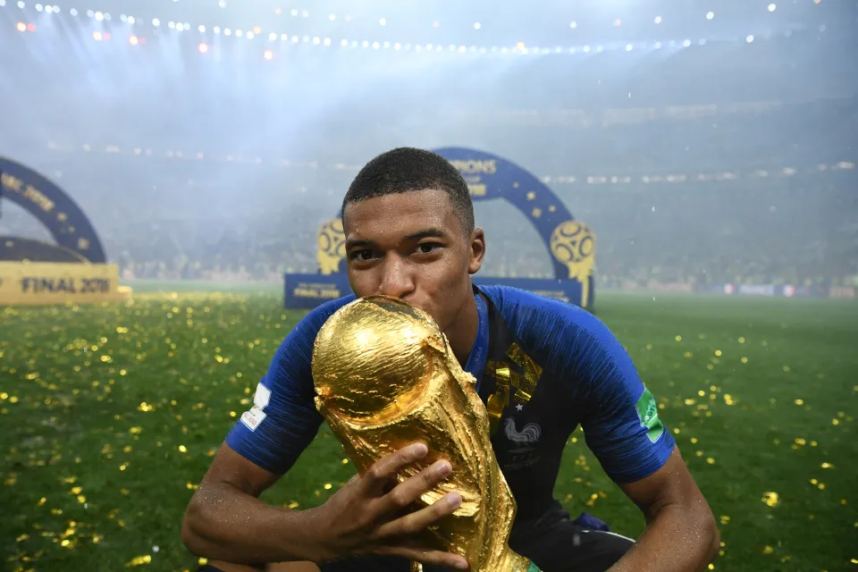 Kylian Mbappe with the World Cup