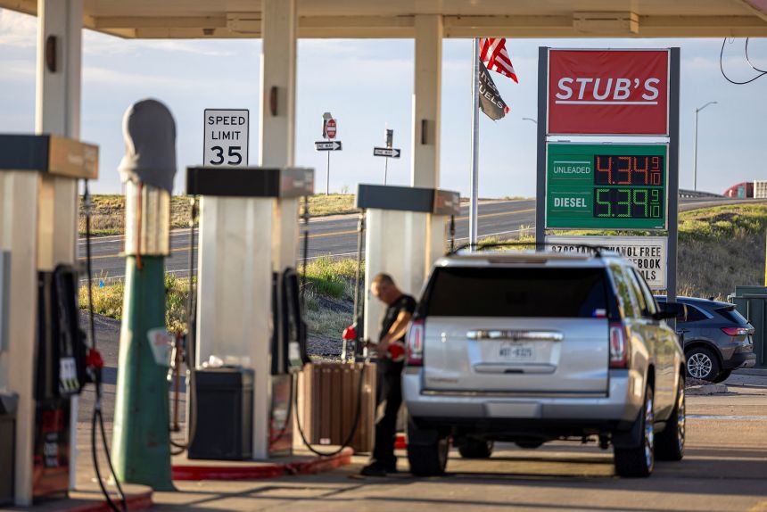 A driver fills up his vehicle at a gas station in Wiggins, Colorado, on May 11, 2026.