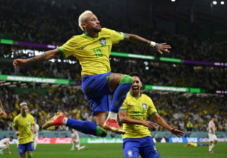 FILE PHOTO: Soccer Football - FIFA World Cup Qatar 2022 - Quarter Final - Croatia v Brazil - Education City Stadium, Doha, Qatar - December 9, 2022 Brazil's Neymar celebrates scoring their first goal with Marquinhos REUTERS/Dylan Martinez/File Photo