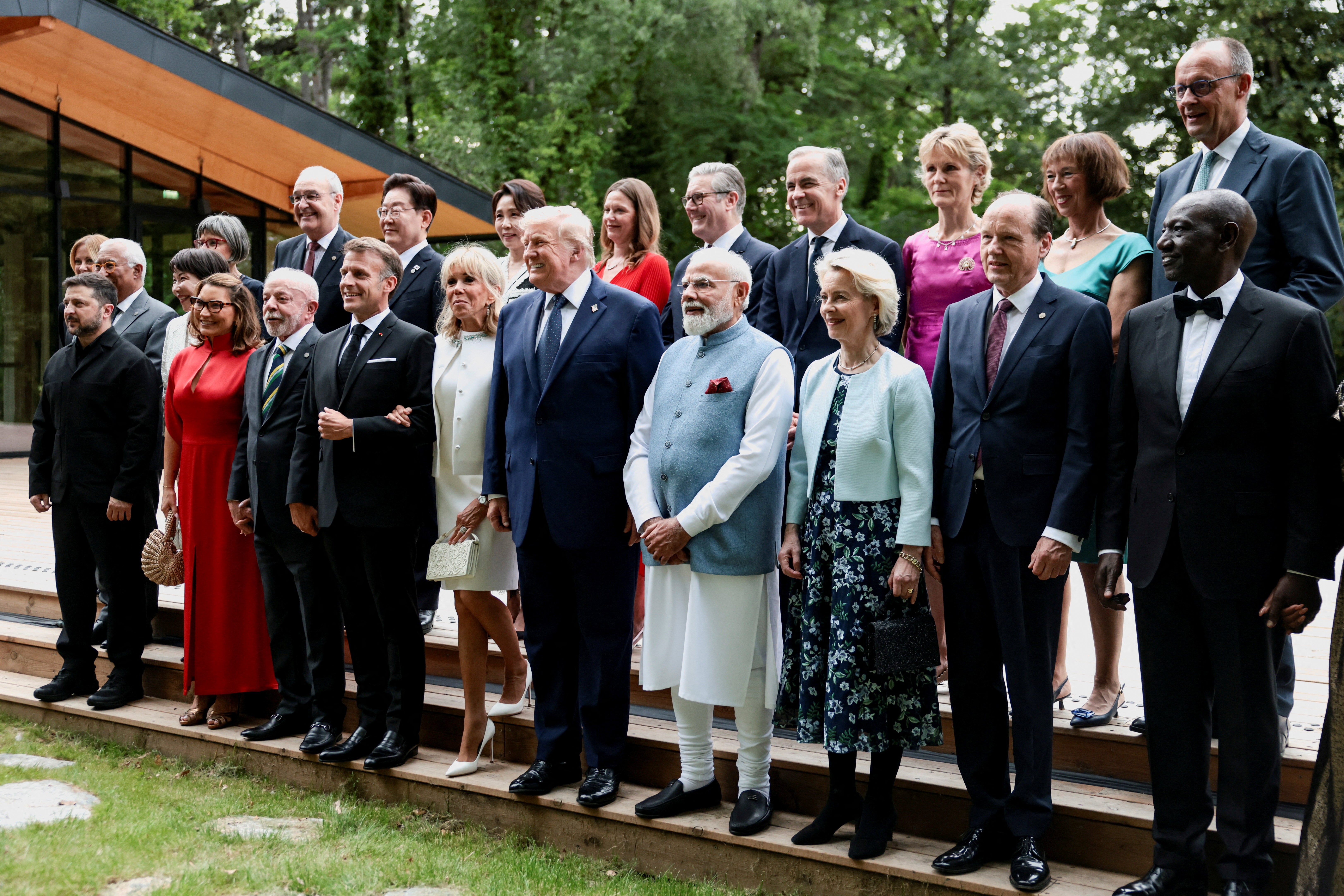 World leaders including Zelensky pose for a photo at the G7 summit on Tuesday