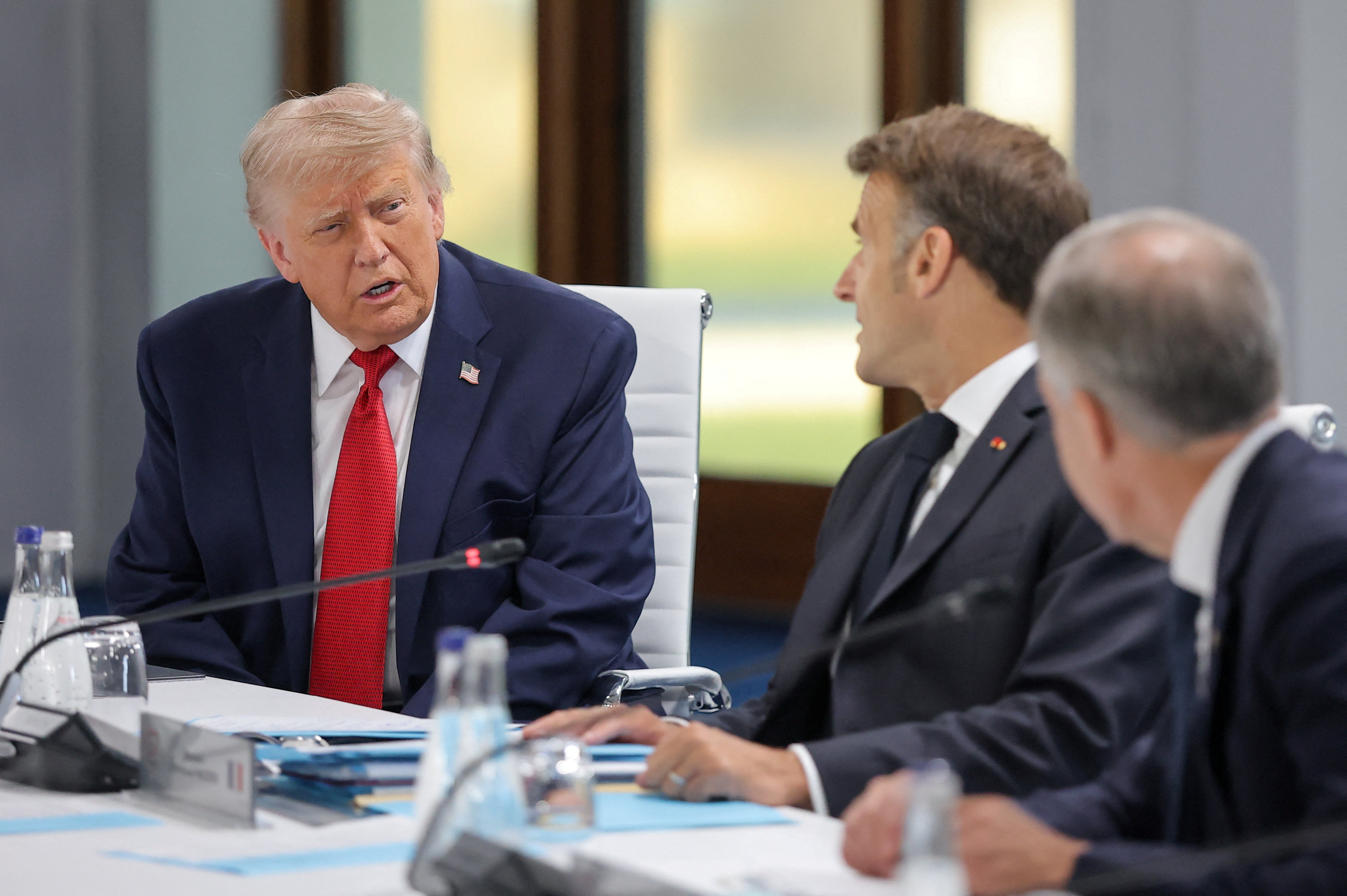 Donald Trump and French President Emmanuel Macron attend a working session with G7 leaders