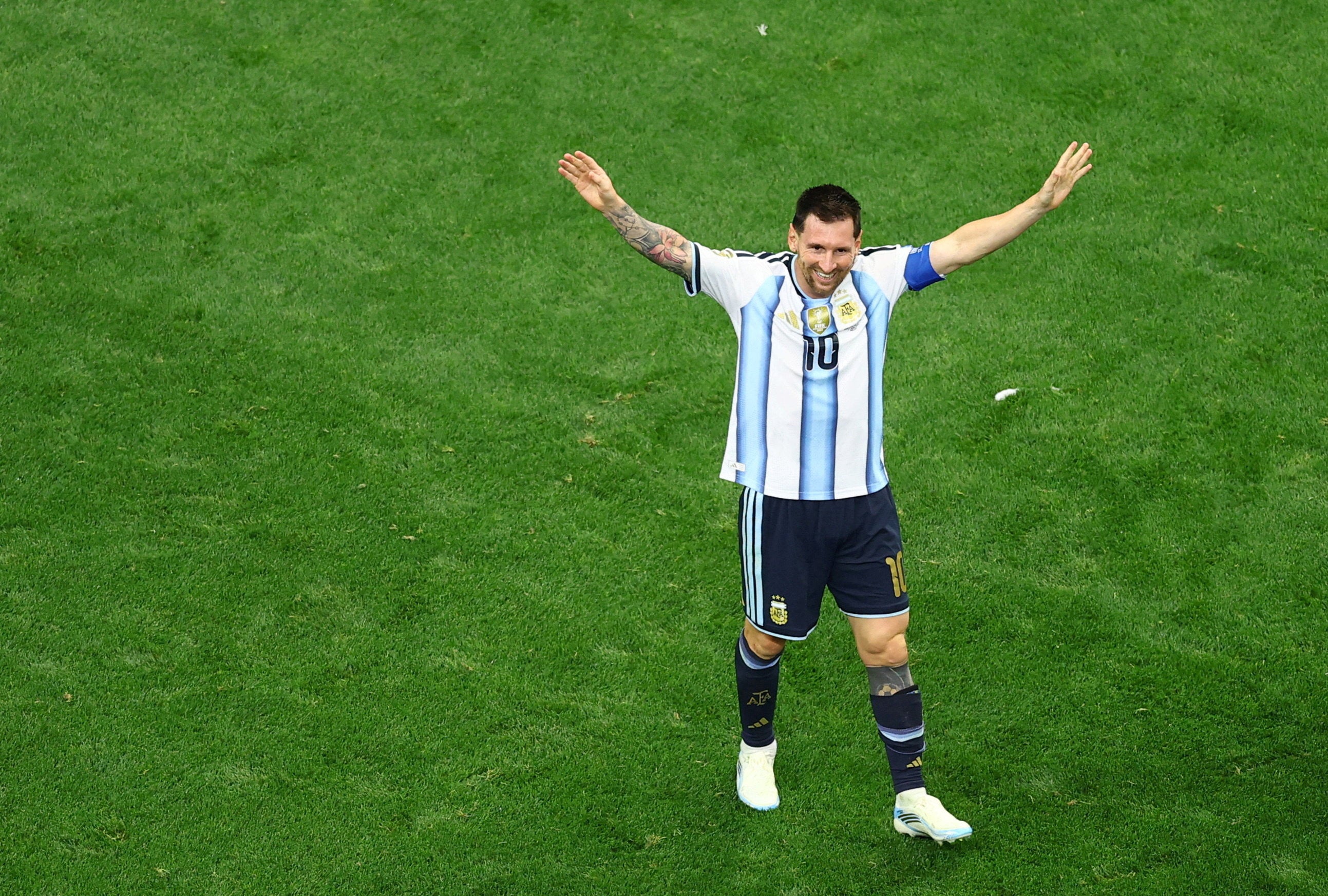Lionel Messi gestures towards the Argentina fans in Dallas