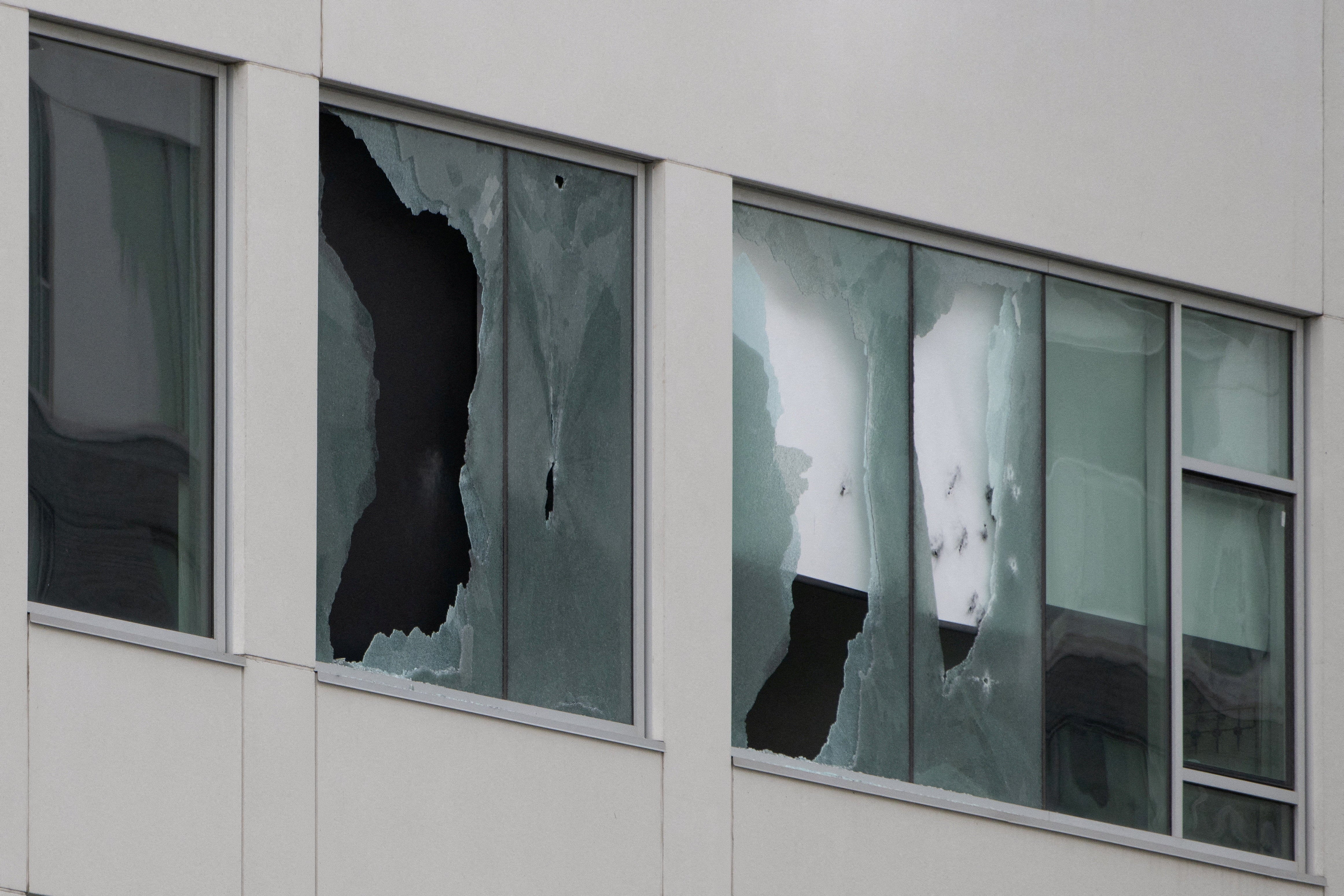 Emergency services received a call at about 11:35 a.m. reporting that a person was pointing a firearm out of a window at a Hilton hotel
