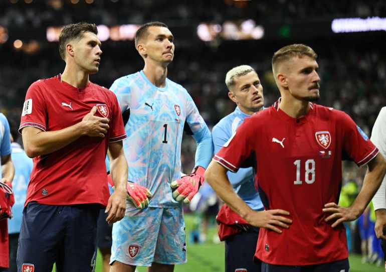 Matej Kovar, Robin Hranac, Michal Sadilek and Tomas Holes react.