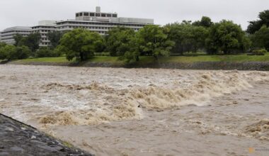 Four injured, flights cancelled in Japan as twin storms approach