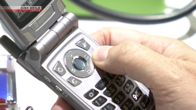 Event in Tokyo revives memories on old mobile phones