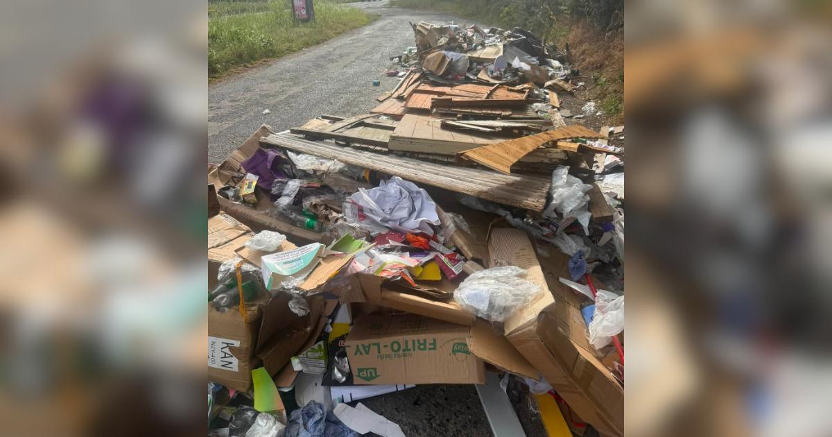 Fly tipped rubbish in Brantham covers layby on A137