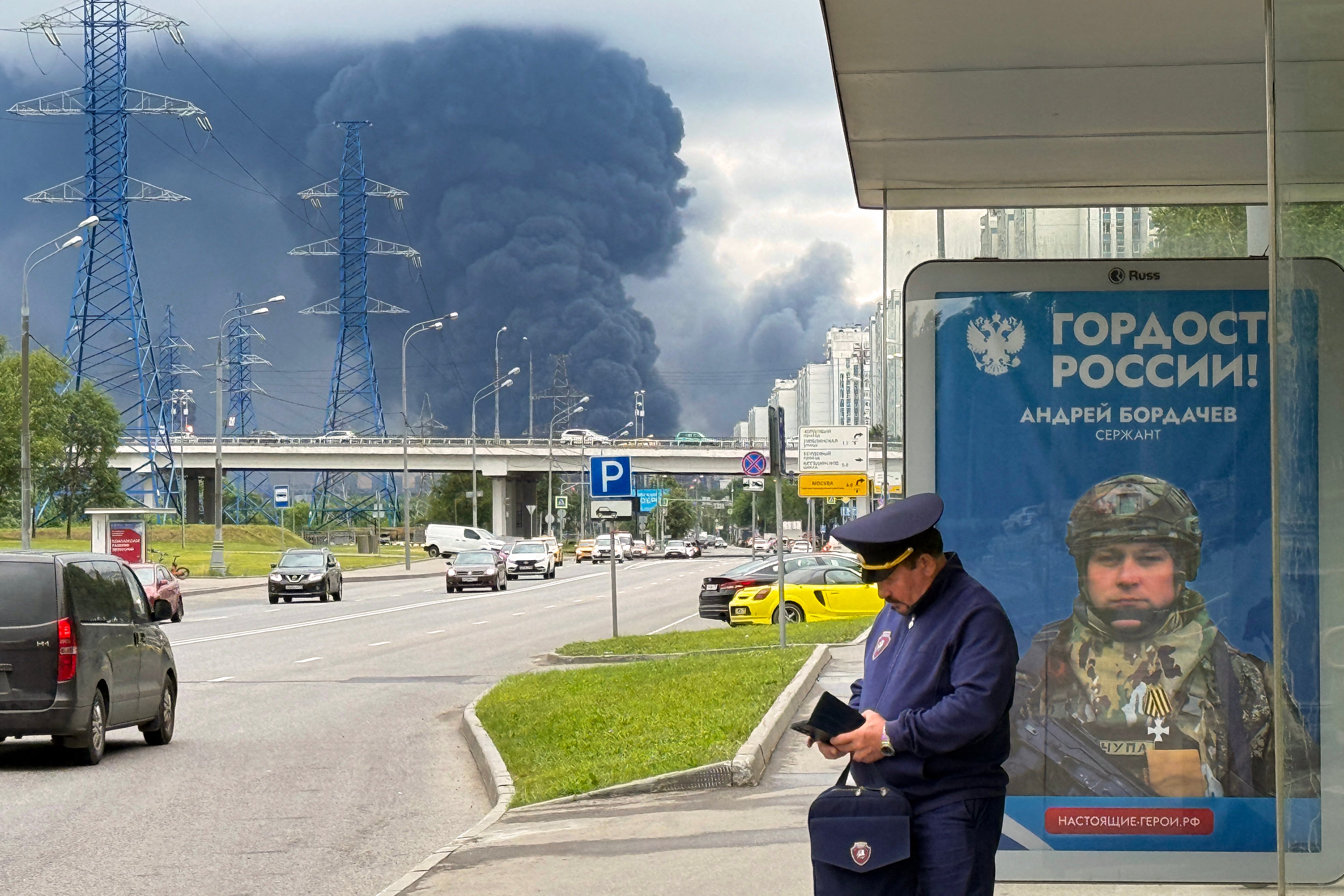 Black smoke rises from the area of the Russian oil producer Gazprom Neft's Moscow oil refinery on the south-eastern outskirts of Moscow