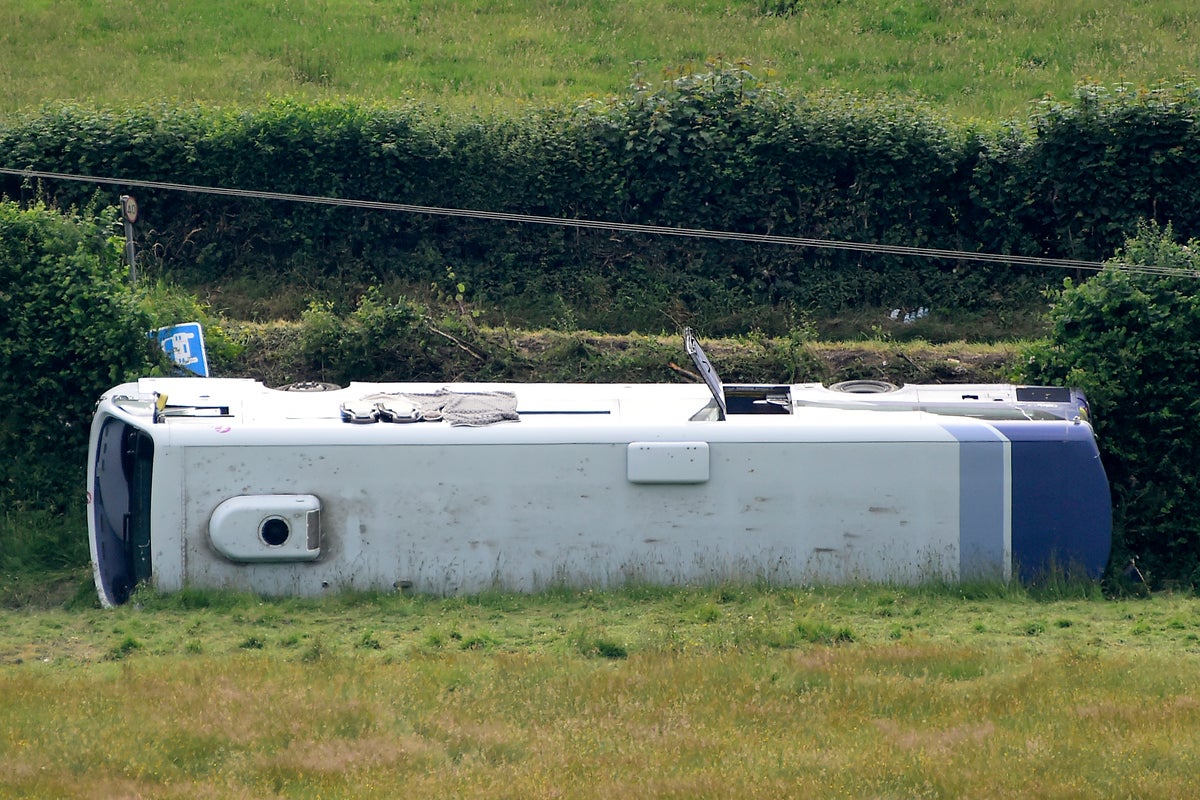 19 injured after bus crash at roundabout in Wales