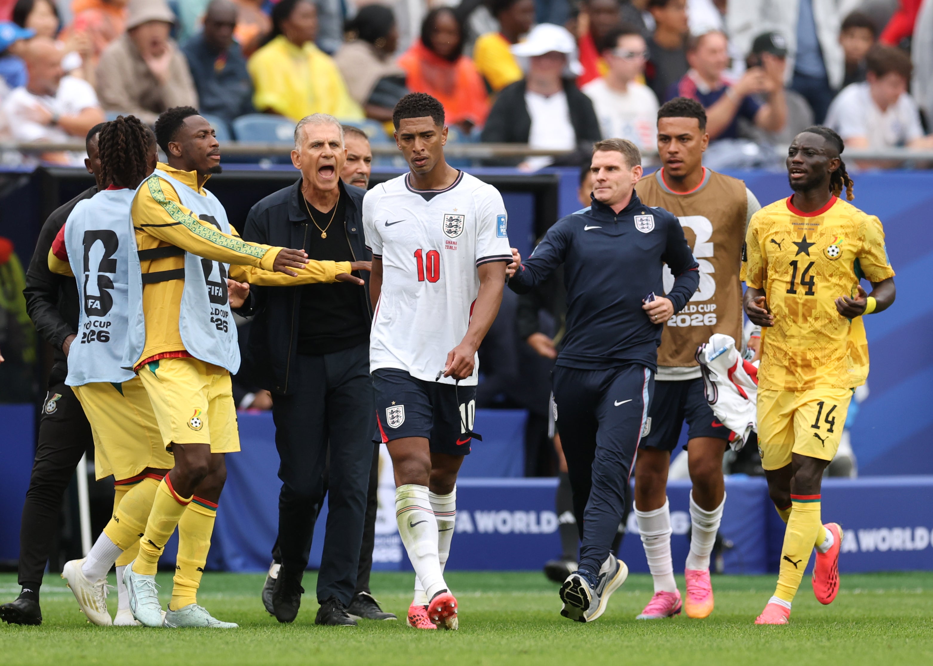 Carlos Queiroz has words with Jude Bellingham as the players walk off the pitch