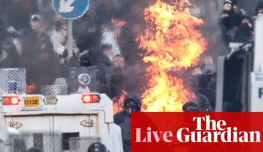 Northern Ireland secretary condemns Belfast riots as ‘racist thuggery’ after 12 police officers injured – UK politics live | Politics