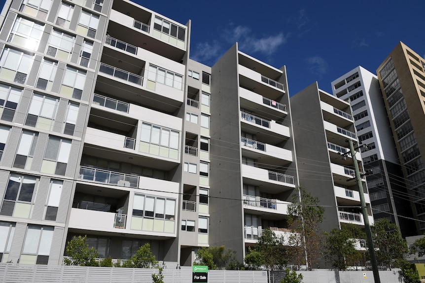 A high-rise unit block in a city.