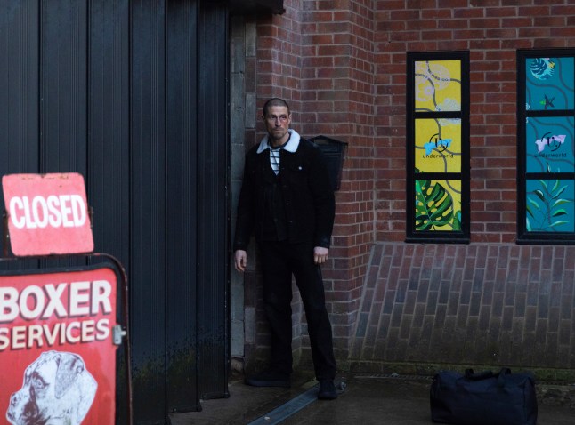 Carl Webster stood outside the garage