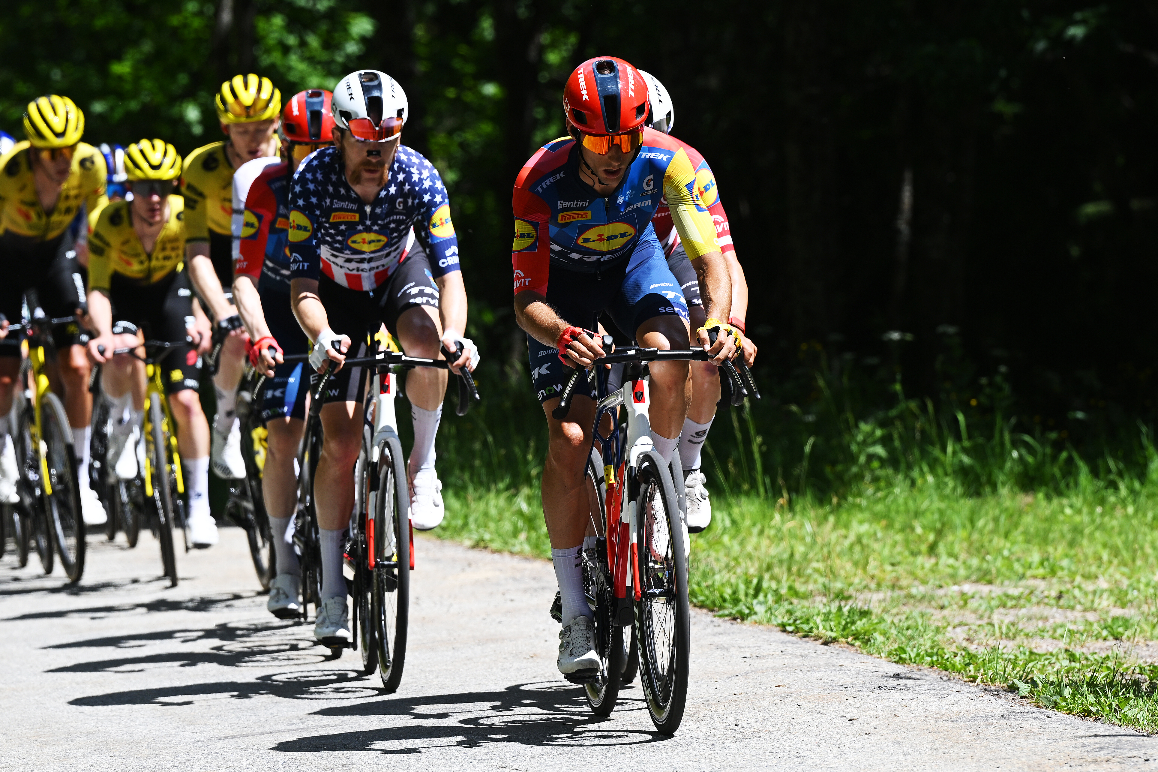 BRISON, FRANCE - JUNE 14: (L-R) Quinn Simmons of United States, Carlos Verona of Spain and Team Lidl - Trek lead the peloton during the 78th Tour Auvergne-Rhone-Alpes 2026, Stage 8 a 120.1km stage from Beaufort to Plateau de Solaison - Brison 1497m / #UCIWT / on June 14, 2026 in Brison, France. (Photo by Dario Belingheri/Getty Images)
