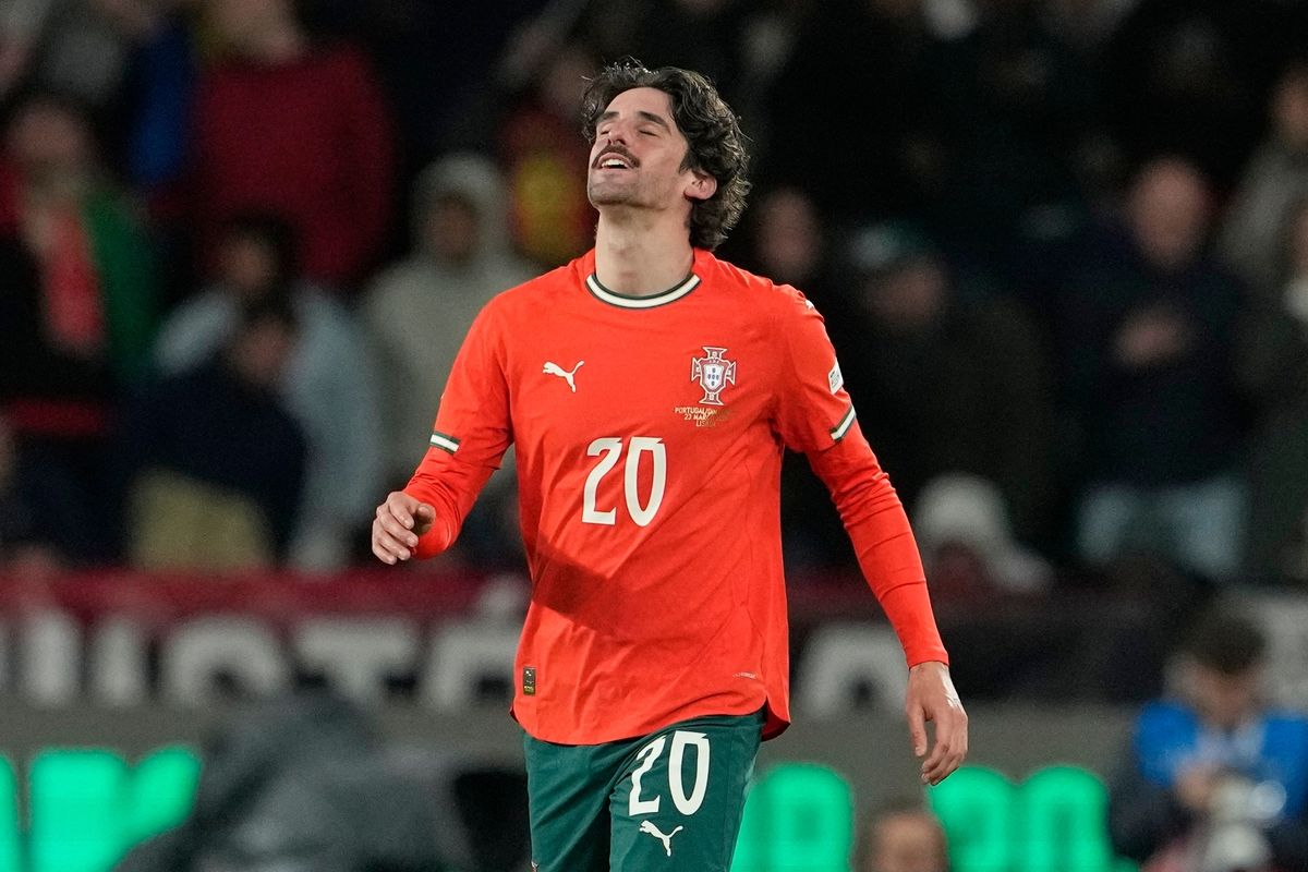 Portugal's Francisco Trincao celebrates after scoring his side's fourth goal during the UEFA Nations League soccer match between Portugal and Denmark