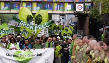 Grenfell demonstrators embrace firefighters during anniversary march - London Evening Standard