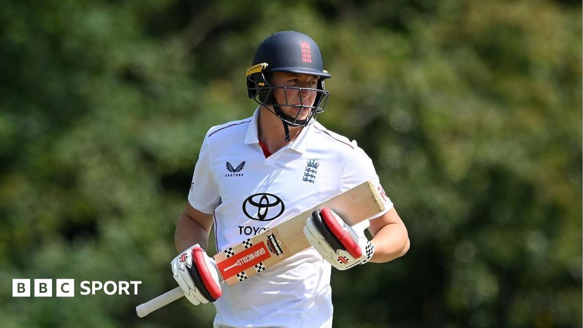 Ben McKinney batting for England Lions, with England helmet and England kit on