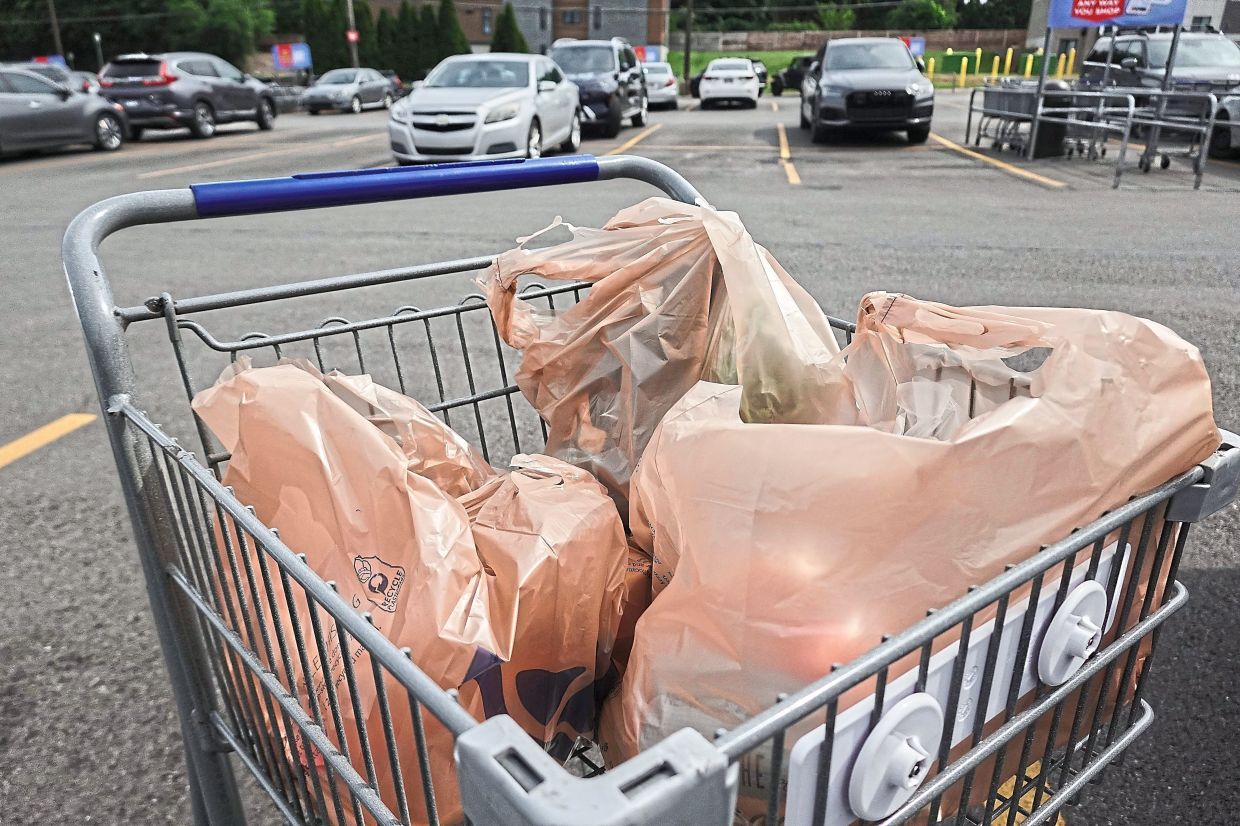 Plastic bags don't go in the recycling bin. What should you do instead?