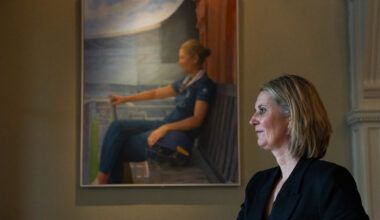 Charlotte Edwards poses in front of her portrait in the Long Room at Lord