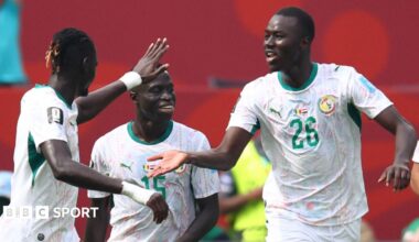 Habib Diarra and Senegal team-mates celebrate their opening goal