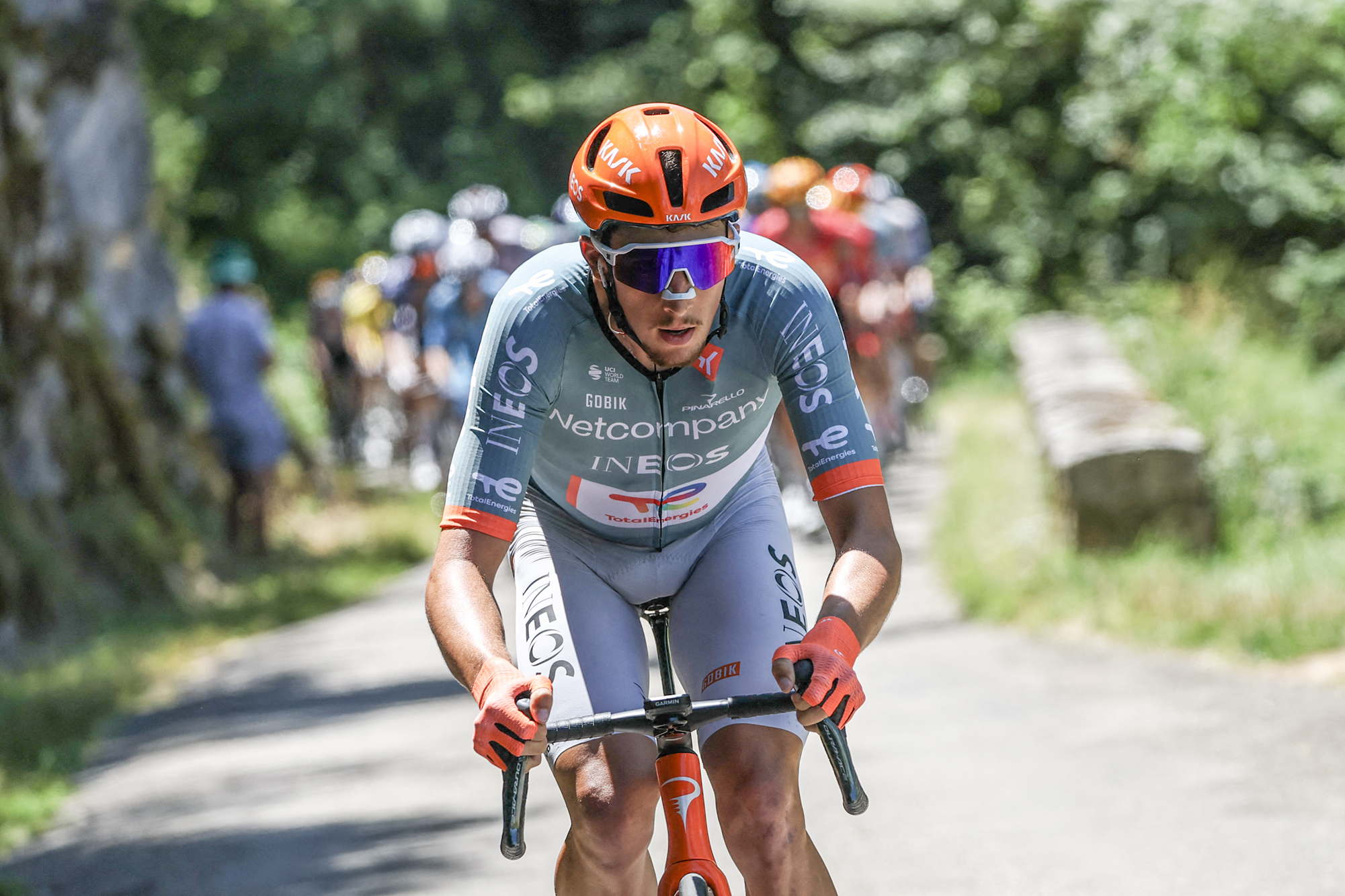 Netcompany Ineos Cycling Team's French rider K&eacute;vin Vauquelin cycles during the 7th stage of the Tour Auvergne-Rhone-Alpes cycling race (formerly known as the Criterium du Dauphine), 133,6km between La Bridoire and Grand Colombier in the French Alps on June 13, 2026. (Photo by Anne-Christine POUJOULAT / AFP via Getty Images)