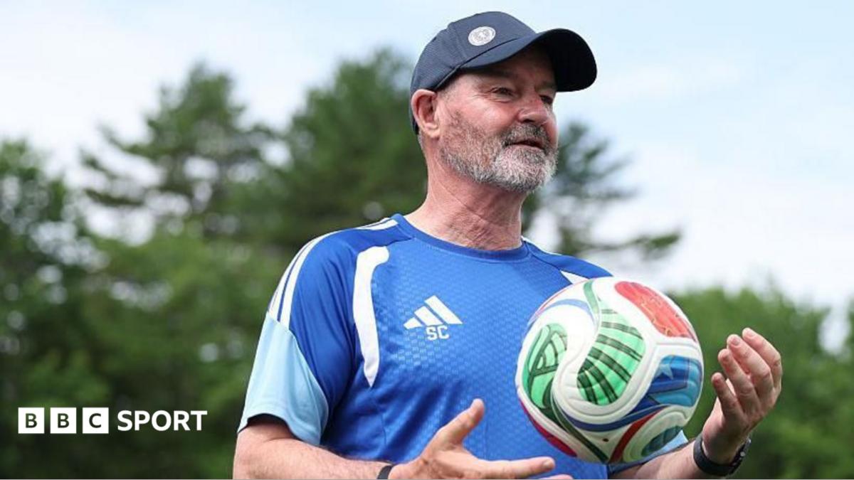 Andy Robertson and Steve Clarke celebrate Scotland's win over Haiti at the World Cup