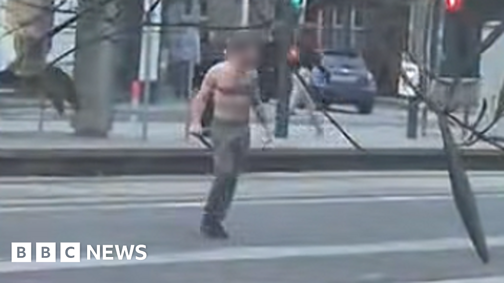 Four in hospital after bare-chested man with weapon roams around Edinburgh - BBC