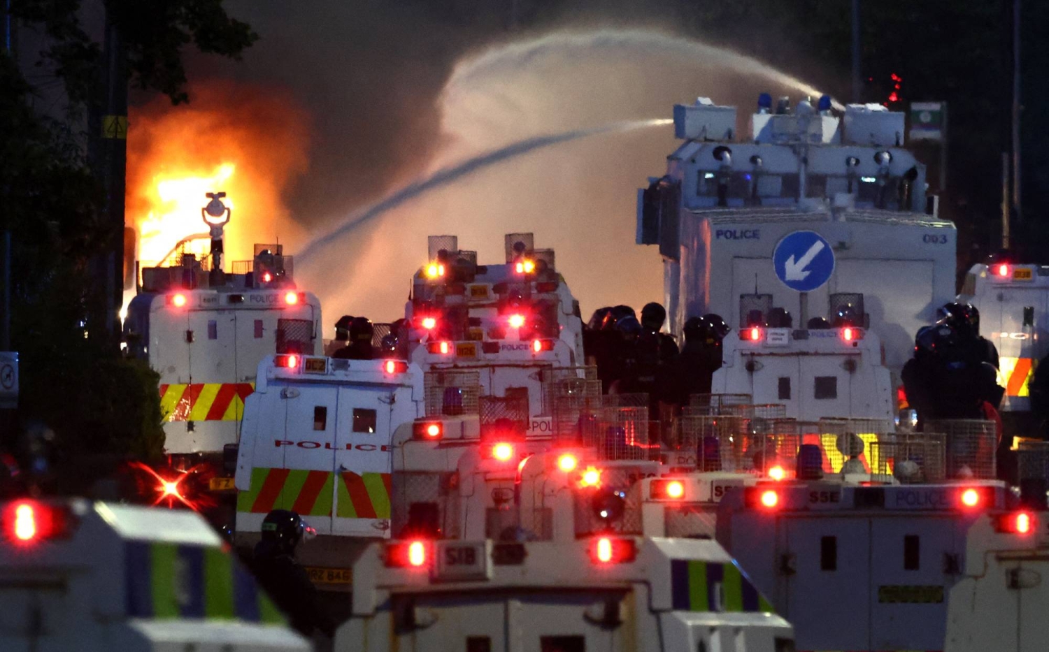 Northern Irish police use water cannon on second night of protests