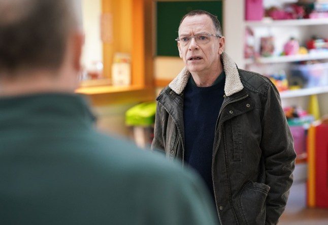 Ian standing in The Albert in EastEnders