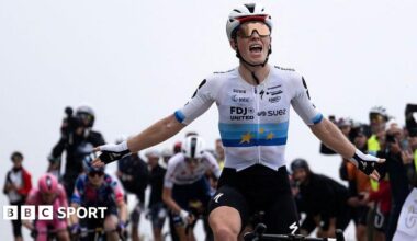 Demi Vollering celebrates as she crosses the finish line to win stage eight of the Giro d'Italia Women 2026
