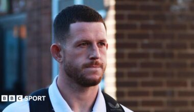 Cade Cust walks into the ground before a game for Hull FC
